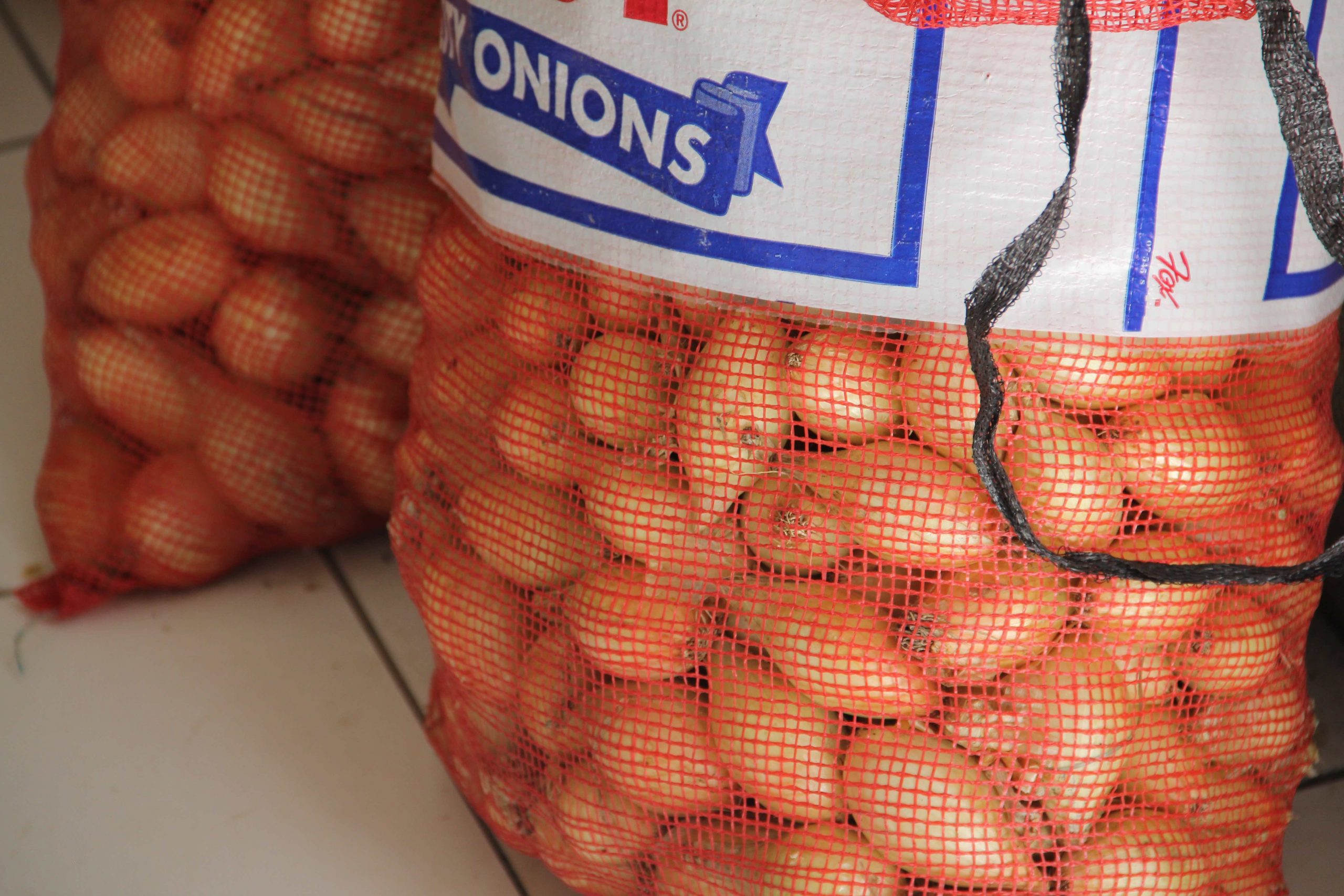 Locally grown onions in storage at the Department of Agriculture Marketing Unit will be among other local produce on sale at Agrofest at the Villa Grounds in Charlestown on March 26, 2021 (file photo)