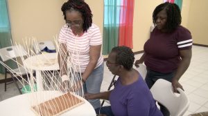 Ms. Marilyn Pemberton local Basketmaker for more than 26 years and facilitator at the Department of Gender Affairs’ three-week Basket Weaving Workshop at the Pond Hill Community Centre instructing participants at a session on April 22, 2021,