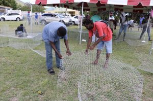 Participants at a Fish Trap Making Workshop hosted by the Department of Gender Affairs in collaboration with the Jessups, Cotton Ground, Barnes Ghaut Fisherfolk Association and the Department of Marne Resources at the Jessups playing field on May 08, 2021