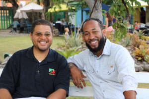 (L-r) Mr. Michael Henville, President of the Caribbean Foundation for Children Inc; and Mr. Jahreem Encarnacion, the foundation’s Vice President speaking with the Department of Information on May 14, 2021 in Charlestown