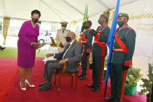 Dr. Judy Nisbett receiving a 2020 Medal of Honour from Sir Tapley Seaton, Governor General of St. Kitts and Nevis on August 17, 2021, at an Investiture Ceremony at Government House in St. Kitts for her outstanding contribution to National Service in Crisis