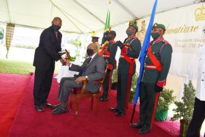 Mr. Brian Dyer receiving a 2020 Medal of Honour from Sir Tapley Seaton, Governor General of St. Kitts and Nevis on August 17, 2021, at an Investiture Ceremony at Government House in St. Kitts for his outstanding contribution to National Service in Crisis