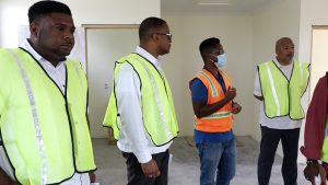 Members of the Nevis Island Administration Cabinet touring the site of the new Technical and Vocational Education and Training wing at the Gingerland Secondary School on August 12, 2021 (l-r) Hon Troy Liburd, Junior Minister of Education; Hon. Mark Brantley, Premier of Nevis; Mr. Darius Cumberbatch, Engineer for FDL Consult Inc; and Hon Spencer Brand