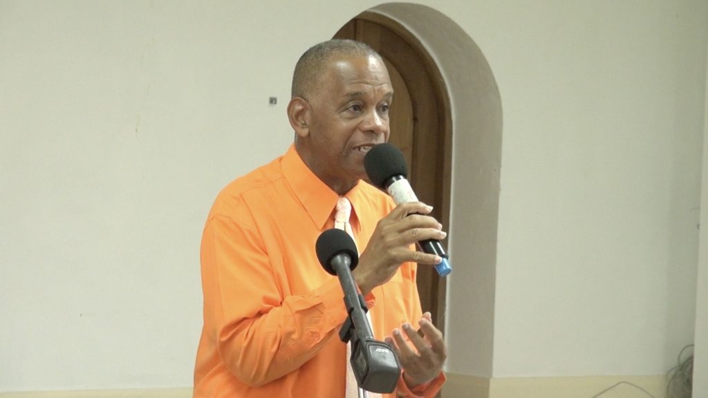 Hon. Eric Evelyn, Minister of Social Development and Youth in the Nevis Island Administration delivering remarks at the Opening Ceremony of the Sustainable Development Unit’s Retirement Preparedness Seminar at the Anglican Church Hall on August 25, 2021