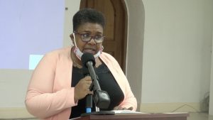 Ms. Joyce Moven, Coordinator of the Sustainable Development Unit in the Ministry of Social development delivering remarks at the Opening Ceremony of the Unit’s Retirement Preparedness Seminar at the Anglican Church Hall on August 25, 2021