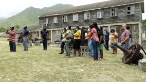 Hon. Troy Liburd, Junior Minister of Education, and his Permanent Secretary Mr. Kevin Barrett on a tour with public school principals, deputies and supervisors of public schools on Nevis at New River Estate in Gingerland on August 27, 2021