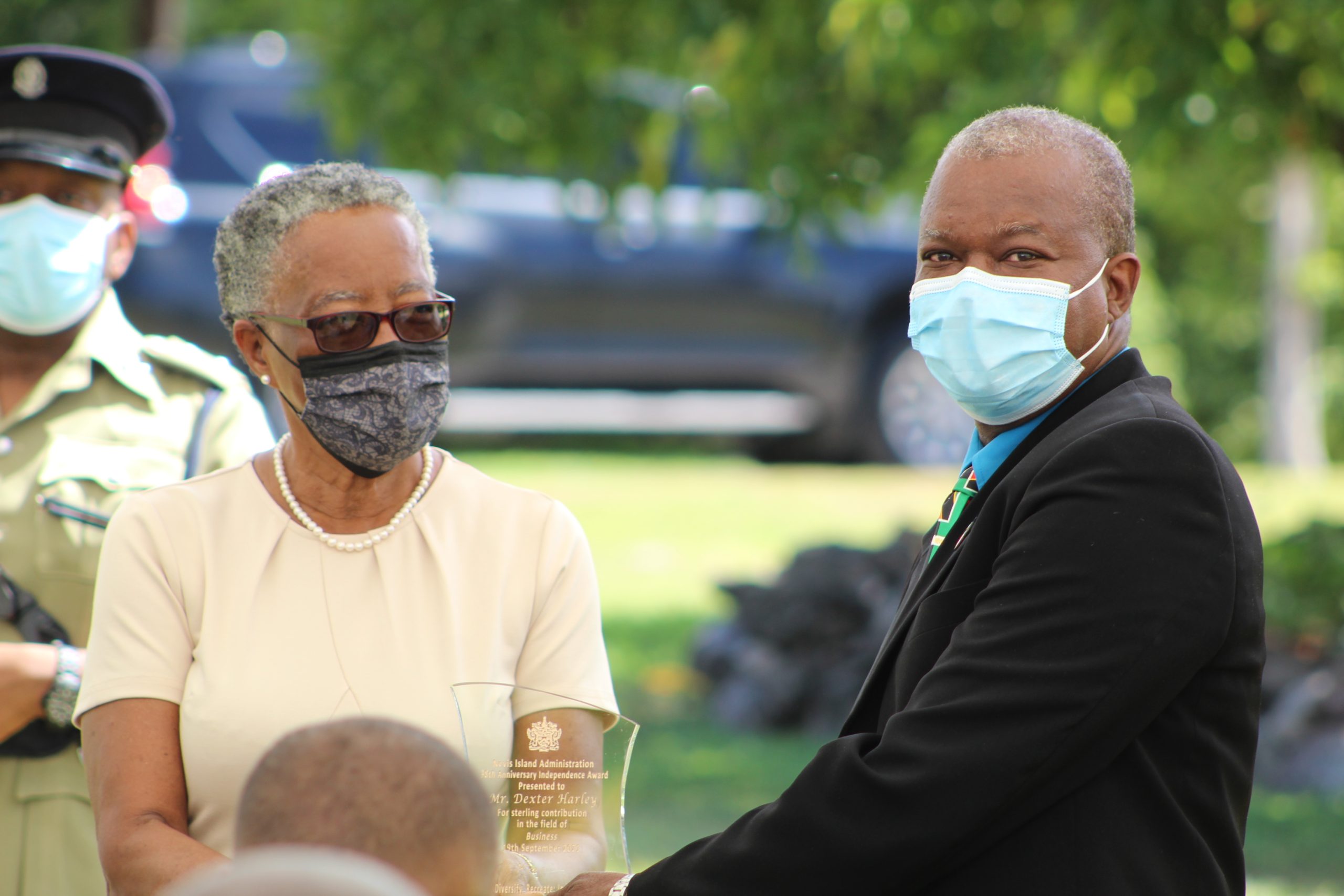 Her Honour Mrs. Hyleeta Liburd, Deputy Governor General on Nevis, presenting a plaque to Mr. Dexter Harley at an Awards Ceremony at Government House on September 20, 2021, on the occasion of the 38th Anniversary of St. Christopher and Nevis