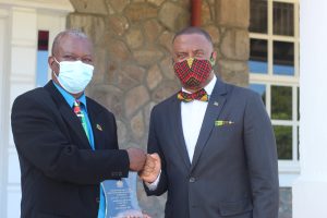 Hon. Mark Brantley, Premier of Nevis congratulates Mr. Dexter Harley, Independence Day honoree for his contribution to Business following an Awards Ceremony at Government House on September 20, 2021