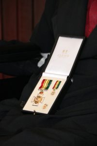 The 2020 Medal of Honour presented to Dr. Albert Linton Liburd Sr. by Her Honour Mrs. Hyleeta Liburd, Deputy Governor General on Nevis his outstanding contribution to National Service in the field of Medicine at an Investiture Ceremony at Government House at Bath Plain on September 09, 2021