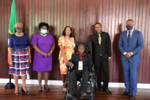 (L-R): Her Honour Mrs. Hyleeta Liburd, Deputy Governor General on Nevis; Hon. Hazel Brandy Williams, Junior Minister of Health; Mrs. Carla Liburd and her husband and honouree Dr. Albert Linton Liburd Sr. - recipient of the 2020 Medal of Honour, their son Dr. Linton Liburd Jr.; and Hon. Mark Brantley, Premier of Nevis following the Investiture Ceremony at Government House in Bath Plain on September 09, 2021
