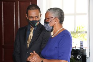 Her Honour Mrs. Hyleeta Liburd, Deputy Governor General on Nevis interacts with Dr. Linton Liburd Jnr.,  son of Dr. Albert Linton Liburd Sr. and recipient of the 2020 Medal of Honour following the Investiture Ceremony at Government House in Bath Plain on September 09, 2021 