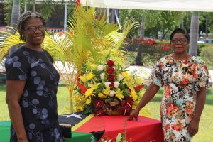 Ms. Christiana Smith (left) and her sister Ms. Gloris Jeffers at the end of an awards ceremony at Government House on September 20, 2021, where she was honoured on the occasion of the 38th Anniversary of Independence