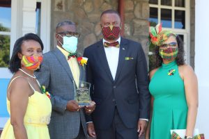 Mr. Carlisle “King Binghi” Pemberton, Independence Day Awardee (second from right) accompanied by his wife Joan Stapleton-Pemberton (extreme right) with Hon. Mark Brantley, Premier of Nevis and his wife Sharon Brantley at Government House on September 20, 2021