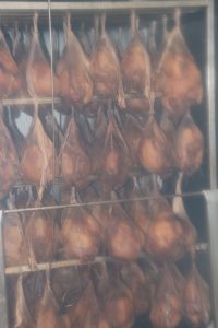 Fresh local chickens in the smoker at the Abattoir Division at the Department of Agriculture on Nevis on November 11, 2021