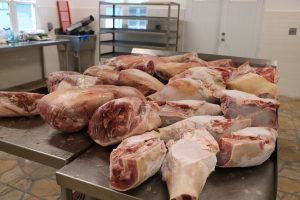 Fresh local pork shoulders among other cuts for smoking at the Abattoir Division at the Department of Agriculture on Nevis on November 11, 2021