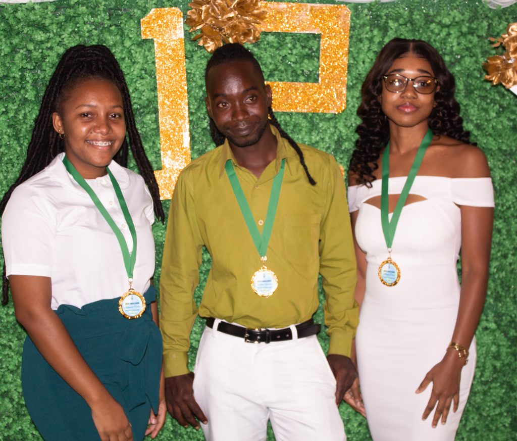 Three of the four youths recognized by the Department of Youth in the Nevis Island Administration as Green Ambassadors (l-r) Ms. Nykeisha Henry; Mr. Dillon Smithen; and Ms. Aleyah Powell at the Nevis Performing Arts Centre on November 04, 2021