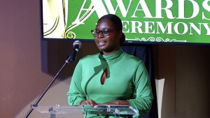 Ms. Kerdis Clarke, Director in the Department of Youth delivering remarks at the department’s Youth Impact 12 Awards Ceremony at the Nevis Performing Arts Centre on November 04, 2021