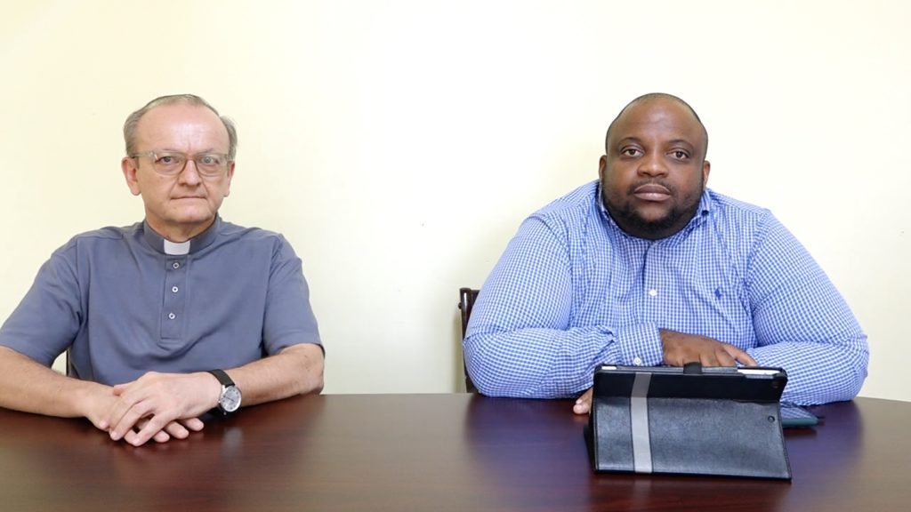 (L-r) Fr. Piotr Palowski, Chairman of the Nevis Christian Council, and Rev. Ron Daniel, Chairman of the Nevis Evangelical Association, at the Department of Information on November 23, 2021