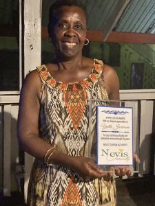 Ms. Yvette Jackman of the Nevis Tourism Authority at a surprise retirement cocktail hosted in her honour on December 20, 2021, by the Nevis Tourism Authority at the Ole House Café in Charlestown
