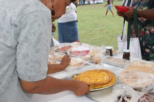 Mrs. Maureen Stapleton, an agro processor from Cotton Ground during her peak producing years presents some of her bottled steamed fruit and traditional fruit tarts. She was honoured by the Inter-American Institute for Cooperation on Agriculture in 2016 for her outstanding performance and contribution to the Agro Processing Sector on Nevis