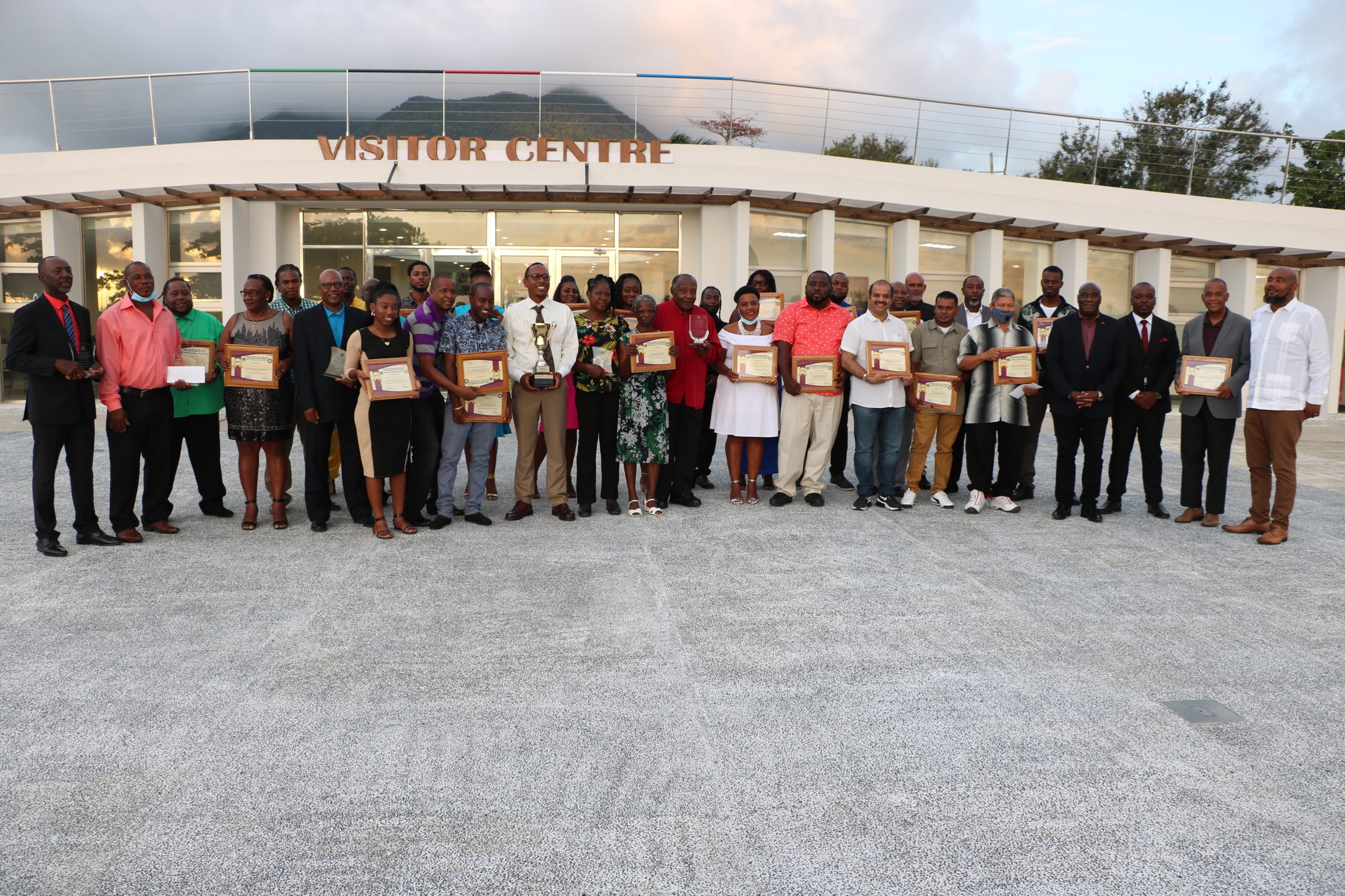 Ministry of Agriculture honourees and Nevis Island Administration officials share a light moment after the ministry’s award and dinner event at the Malcolm Guishard Recreational Park Conference Centre on May 29, 2022