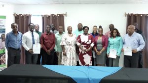 Counterparts from St. Kitts with the newly installed members of the Advisory Board for the Boys Mentorship Programme on Nevis on May 19, 2022, and officials of the Ministry of Health and Gender Affairs on Nevis (front row: l-r): Mr. Philip Mills, Deputy Chairman of the Board; Mr. Mario Phillip, Gender Affairs Officer on Nevis; Mr. Dion Browne, Gender Field Officer in the Ministry of Social Development and Gender Affairs in St. Kitts; Ms. Jasmine Browne, Counsellor; Hon. Hazel Brandy-Williams, Junior Minister of Health and Gender Affairs; Ms. Latoya Jeffers, Assistant Secretary in the ministry; Ms. Agnola Hendrickson of the Bank of Nevis International; and Mr. Hensley Daniel (back row: l-r) Mr. Virgil Jeffers Acting Director of Gender Affairs in St. Kitts; Mr. John Hanley, Permanent Secretary in the Ministry of Tourism; Mr. Darryl Lloyd, Permanent Secretary in the Ministry of Public Infrastructure in St. Kitts; Mr. Jamir Claxton, Director of Sports; Ms. Joy Napier, Principal of the Nevis International Secondary School; and  Mr. Alexis Browne