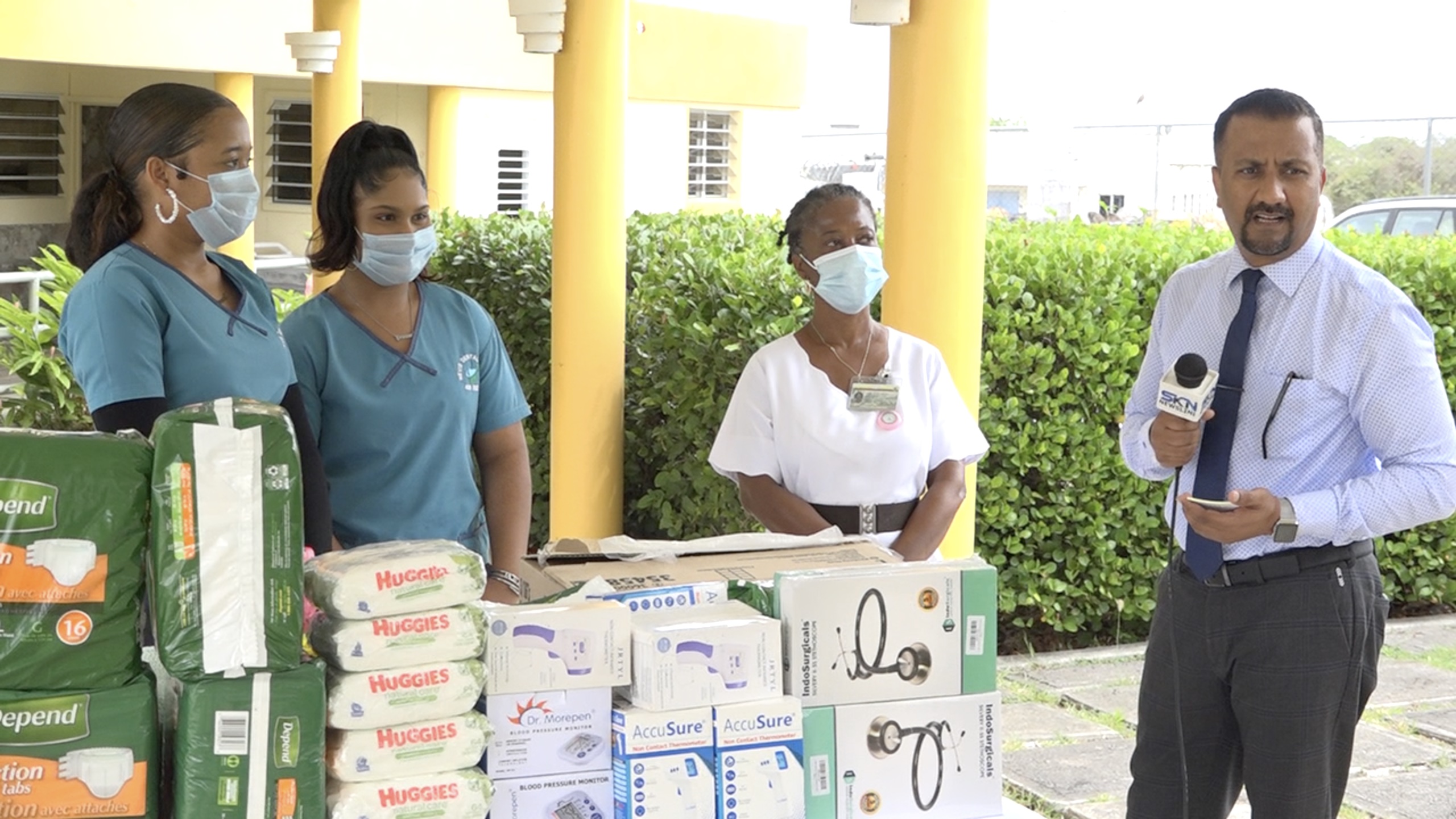 Dental assistants at the Nevis Dental Clinic(l-r) Ms. Iesha Smith and Sasha Samlall; Ms. Donna Hanley, Nurse Manager of the Flamboyant Nursing Home; and Dr. Chinnaswamy, Owner of Nevis Dental Clinic on June 16, 2022