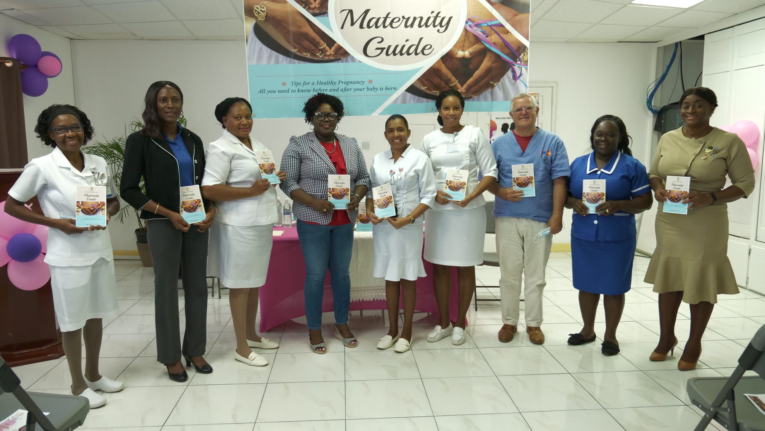 Health officials at the launch of the Ministry of Health and Gender Affairs Maternity Guide booklet on June 24, 2022, (L-R): Nurse Donna Hill in charge of the Brown Hill Health Centre; Ms. Shelisa Martin-Clarke, Permanent Secretary in the Ministry of Health; Nurse Heather David in charge of the Butlers Health Centre; Hon. Hazel Brandy-Williams, Junior Minister of Health; Nurse Chandreka Persaud-Wallace, Matron at the Alexandra Hospital; Nurse Dhaima Golding, Assistant Matron; Dr. William Stones, Obstetrician-Gynaecologist; Kenisha Sargeant, Community Health Worker at the Charlestown Health Centre; and Nurse Deslyn Tyson-Whyte, Acting Coordinator of Community Nursing Services in the Ministry of Health
