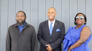 Eric Evelyn of the Concerned Citizens Movement for Nevis 10 to contest the August 05 National Assembly flanked by his witnesses Berley R. Walwyn of Hard Times (left) and Luncinda Hope Merchant of Sheriffs Village (right) moments after his nomination at the David Freeman Center of Excellence on July 26, 2022