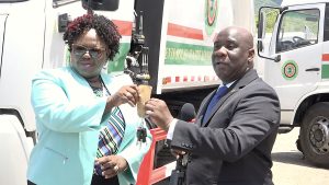 Hon. Alexis Jeffers, Acting Premier of Nevis, hands over the keys to new equipment donated by the Nevis Island Administration to Hon. Hazel Brandy-Williams, Junior Minister of Health, on September 08, 2022, for use at the Nevis Solid Waste Management Authority’s landfill at Long Point