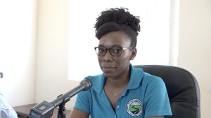 Ms. Xia-Xiang Claxton, Quality Engineer for Surrey Paving & Aggregate Company Caribbean Ltd., delivering remarks at the contract signing ceremony on October 14, 2022, at the Nevis Island Administration’s Conference Room in Charlestown