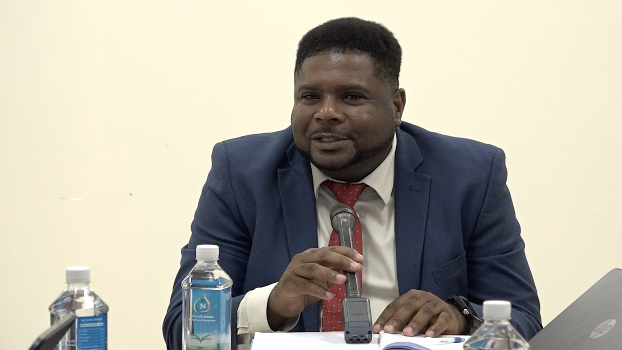 Hon. Troy Liburd, Jr. Minister of Education, welcoming a delegation from the University of the Virgin Islands at his office on October 27, 2022