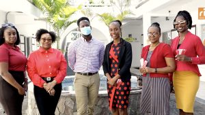 The team from the Department of Gender Affairs in Nevis sharing love in Charlestown on Valentine’s Day, February 14, 2023 (L-r) Ms. Khalia Warner administrative staff member; Ms. Saros Hendrickson, Acting Director of the Department of Gender Affairs; Mr. Mario Phillip, Gender Officer; Hon. Jahnel Nisbett, Minister of Gender Affairs; Ms. Catherine Forbes, Data Analysis Officer; and Ms. Verna Grant Senior Gender Officer