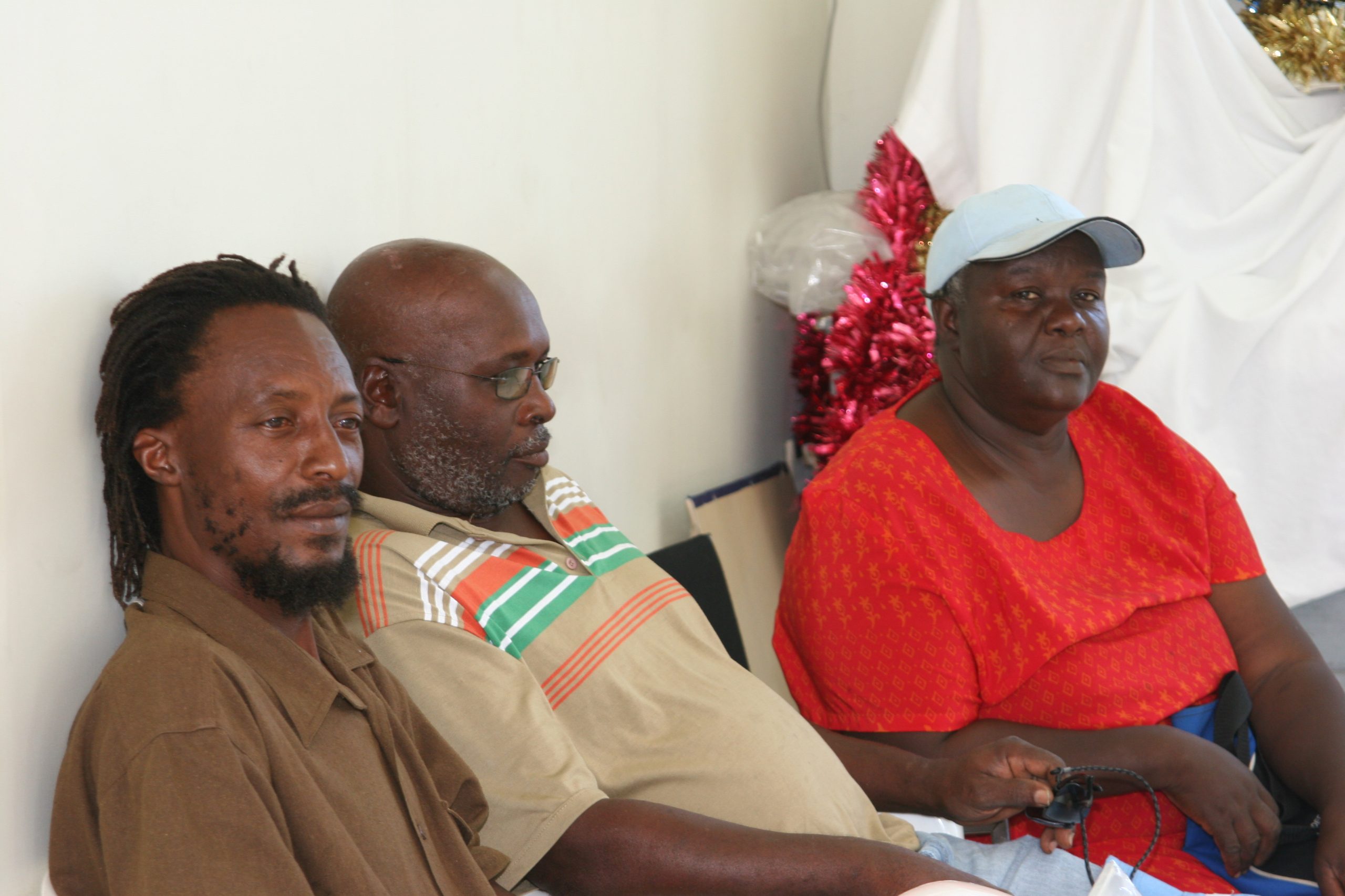 the late Mr. Mervin "Mansa" Tyson (left) with fellow farmers at a meeting at the Department of Agriculture’s conference room at Prospect in June 2009 (file photo)