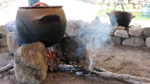 A demonstration of cooking the traditional way outdoors in locally made clay pots at the Nevisian Heritage Village on Fothergills Estate in Gingerland (file photo)