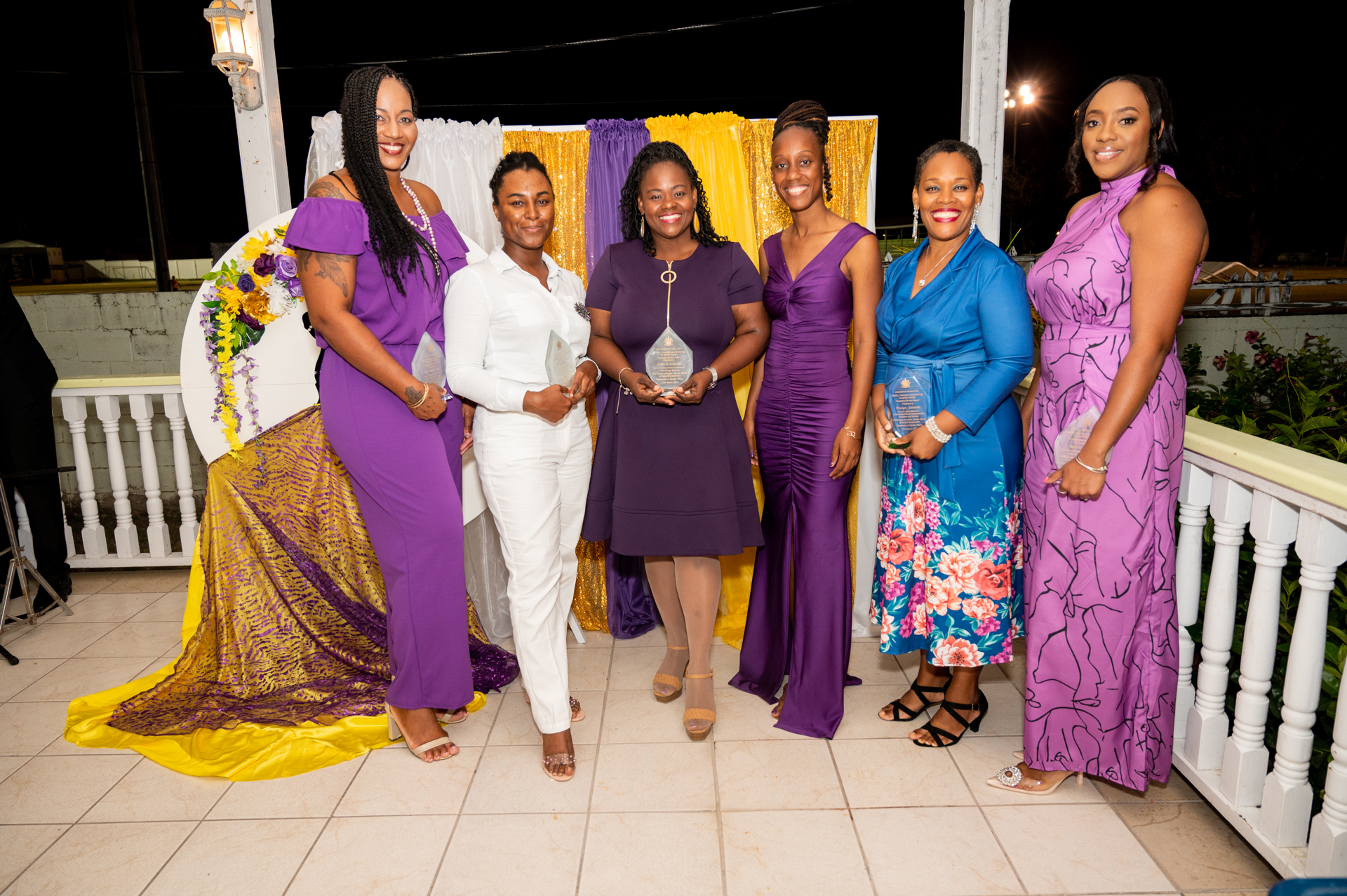 Hon. Jahnel Nisbett, Minister of Gender Affairs and Social Development in the Nevis Island Administration (third from right), recently celebrating at Lyn’s Deli in Charlestown with five of the seven women who were honoured by the Department of Gender Affairs for their contributions in the area of technology on the island (l-r) Dr. Kamara Louisy; Ms. Kenisha Lewis; Mrs. Tamicia Lestrade; Mrs. Deslyn Williams-Johnson; and Ms. Melissa Allen (photo provided)